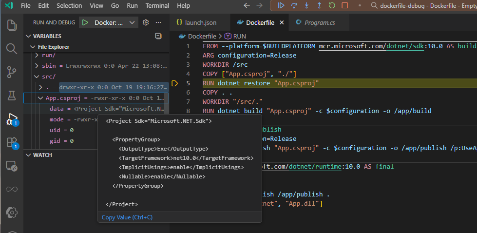 Screenshot showing dockerfile debugging with the File Explorer including a mouseover of the content of /src/App.csproj on the left and a Dockerfile with an active break point on line 5 on the right